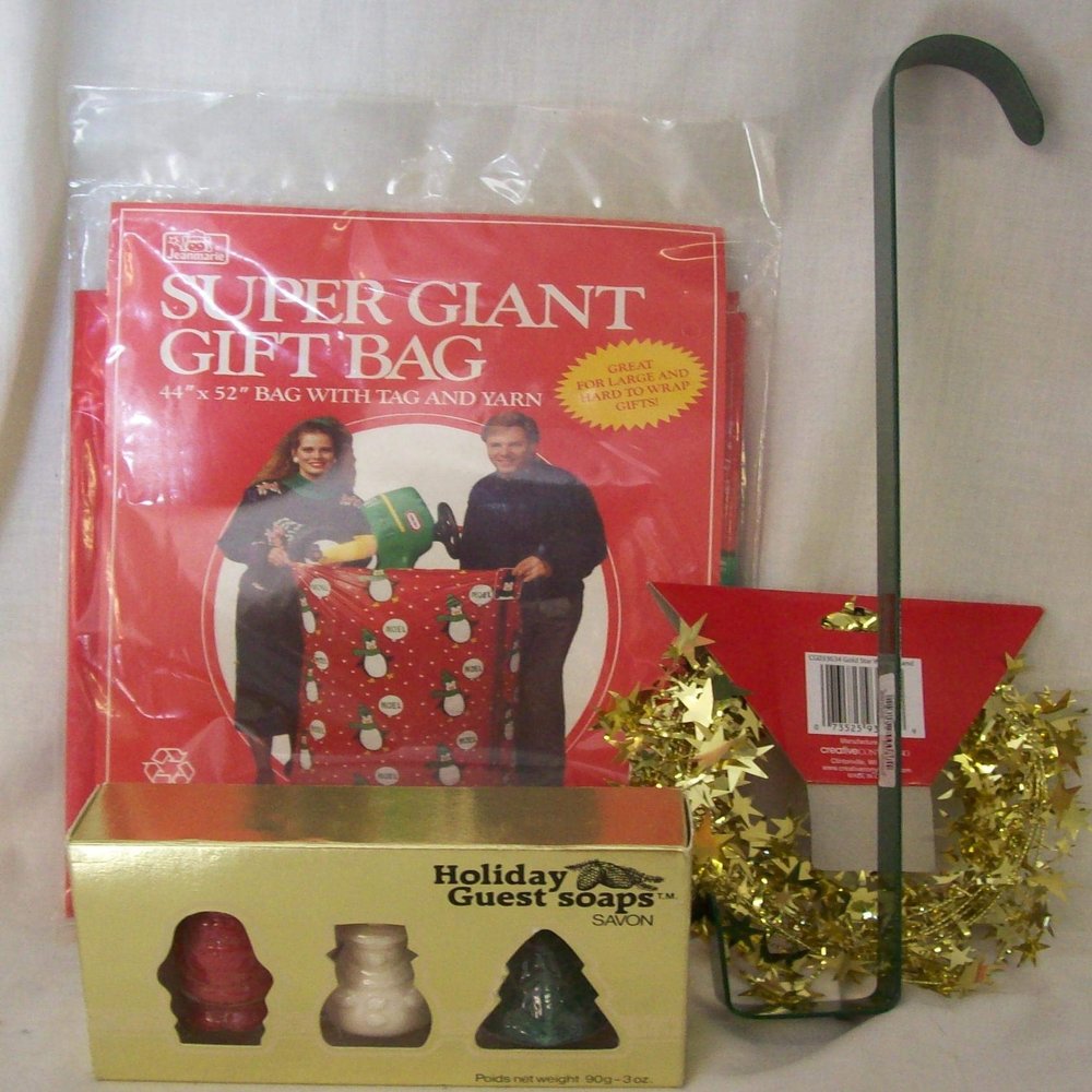 Holiday Style 4 Piece Christmas Assortment Giant Gift Bag, Wreath Hanger, Santa Soaps and Garland