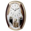 CUYOU Musical Motion Chime Wall Clock with Rotating Pendulum, Decorative Wall Clock, 18 Melodies, for Home, Hotel, Library or Church Decor. view 1