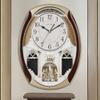 CUYOU Musical Motion Chime Wall Clock with Rotating Pendulum, Decorative Wall Clock, 18 Melodies, for Home, Hotel, Library or Church Decor. view 4