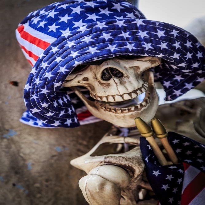Posterazzi PDDUS38EWI0061LARGE USA, Oregon, Redmond, Bend. Skeleton Decorated for 4th of July Photo Print, 24 x 36, Multi