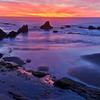 Posterazzi PDDUS38DGU0225 Sunset Over The Pacific Ocean from Seal Rock Along The Oregon Coast Photo Print, 24 x 18, Multi view 1