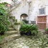 Posterazzi PDDEU16JEG0842LARGE Italy, Basilicata, Matera. Plants Adorn The Outside Walls of The Sassi Houses Photo Print, 24 x 36, Multi view 1