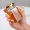 Adabocute 4oz Hexagonal Honey Jars - Glass Honey Jars with Gold Lids, Wooden Dippers, Bee Charms and Jutes - Hexagon Jars for Baby Shower, Wedding and Party Favors, 12 Pack view 3