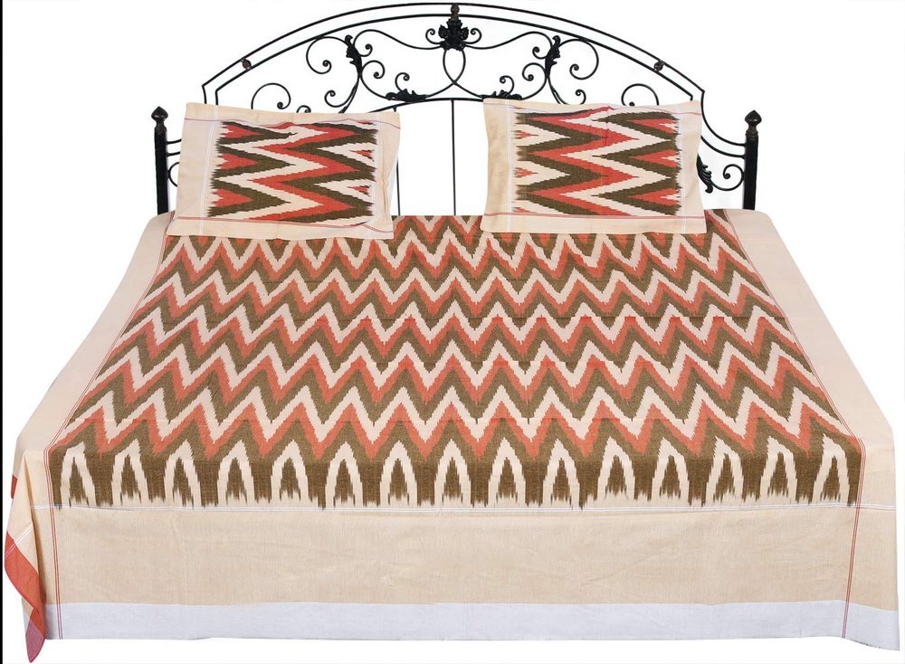 Exotic India Ikat Handloom Bedspread from Pochampally with Zigzag Weave in Multicolor Thread - Pure Cotton with P - Color Golden Straw Color