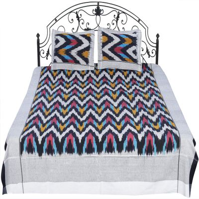 Exotic India Ikat Handloom Bedspread from Pochampally with Zigzag Weave in Multicolor Thread - Pure Cotton with P - Color Moon Struck Color
