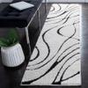 SAFAVIEH Florida Shag Collection Runner Rug - 2'3" x 7', Ivory & Black, Non-Shedding & Easy Care, 1.2-inch Thick Ideal for High Traffic Areas in Living Room, Bedroom (SG471-1290) view 1