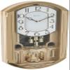 Bulova C4900 Golden Music Wall Clock | Gold-Tone Case with Rotating Crystal Pendulum | 12 Melodies | Adjustable Volume | Night Shutoff view 1