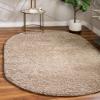 Unique Loom Solid Shag Collection Area Rug (5' 1" x 8' Oval, Taupe) view 1