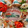 Artisan fall, autumn, harvest wreath for front door or inside decorations. Features green truck, farm fresh pumpkins, hayrides, caramel apples, cider, fall flowers. Very full 20x20x6 view 3