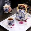 Blue and white retro handle pot tea set ceramic Chinese household teapot teacup view 4