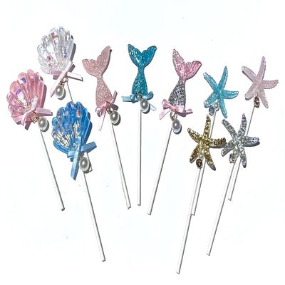 Mermaid, Seashell, and Seastar Resin Cake/Cupcake Toppers With Sparkles And Pearl Bows Decorations For Birthday parties, Pool Parties, Under The Sea Themed parties, Baby Showers, Bridal Showers, And More (Set of 10)