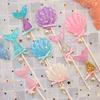 Mermaid, Seashell, and Seastar Resin Cake/Cupcake Toppers With Sparkles And Pearl Bows Decorations For Birthday parties, Pool Parties, Under The Sea Themed parties, Baby Showers, Bridal Showers, And More (Set of 10) view 2