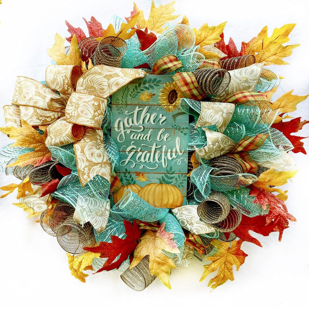 Artisan fall harvest wreath for front door or inside decorations. One of a kind handmade wreath is very full, made with mesh, autumn leaves and beautiful pumpkin ribbon. Measures 18x18x6