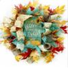 Artisan fall harvest wreath for front door or inside decorations. One of a kind handmade wreath is very full, made with mesh, autumn leaves and beautiful pumpkin ribbon. Measures 18x18x6 view 1