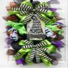 Artisan Salem witch Halloween swag for front door or inside decorations. Very full, made with black & metallic mesh, ribbon, and measures 31' H X 21' W view 1