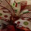 Whimsical Christmas wreath, elf ribbon, glitter, large glitter snowflake, tons of ribbon and embellishments view 3