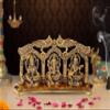 AONA Ganesha Lakshmi and Saraswati Idol Sculpture Seated On Peacock Throne Golden Height 5.5 Inches Width 11.0 Inches view 1