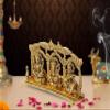 AONA Ganesha Lakshmi and Saraswati Idol Sculpture Seated On Peacock Throne Golden Height 5.5 Inches Width 11.0 Inches view 3