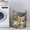 Ambesonne Gothic Laundry Bag, Chest Bones Ribcage Flowers Butterflies Autumn, Hamper Basket with Handles Drawstring Closure for Laundromats, 13" x 19", Mustard Tan view 2