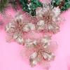 24Pcs Christmas Rose Gold Glitter Mesh Holly Leaf Artificial Poinsettia Flowers Picks Tree Ornaments 6.3"W for Rose Gold Christmas Tree Wreath Garland Floral Gift Winter Wedding Holiday Decoration view 4