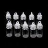 QXcom 60 Pieces 1ml Mini Small Clear Glass Bottles Vials Tiny Jar with Plastic Stopper Miniature Bottle Message Bottle Gift DIY Decoration Wishing Bottle for Pendant Arts Crafts Wedding Party Favors view 4