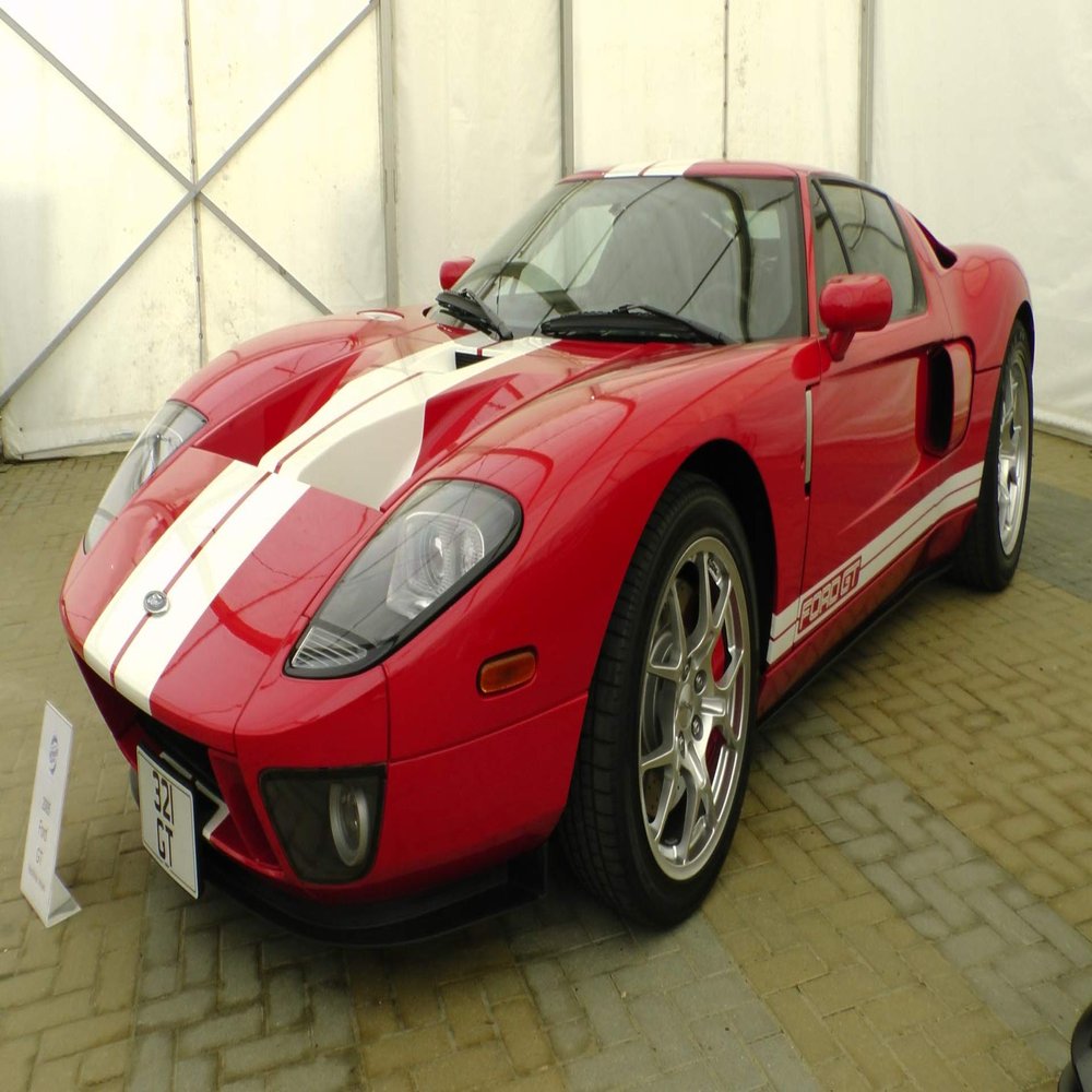 Iconic Arts Red Ford GT Car On Display Laminated Poster 24x36