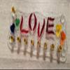 Burning love LGBTQ glass menorah by YafitGlass view 2
