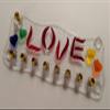 Burning love LGBTQ glass menorah by YafitGlass view 3