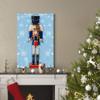 WEXFORD HOME Nutcracker on Blue Wall Art, Festive Christmas & Winter Decorations, Cute Snowflake Design, Premium Gallery Wrapped Canvas Decor, Ready to Hang, 12 in H x 18 in W, Made in America view 3