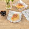 Restaurantware-10 x 8 Inch Treat Bags, 100 Microwavable Cookie Bags - Lip And Tape Design, Heat-Resistant, Clear Plastic Resealable Bakery Bag, Grease-Resistant, For Candy, Nuts, And Party Favors view 3