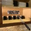 Clear Cabinet Guard - Door Protector. Fits Over Door Edge to Protect From Water, Nicks, and Daily Wear. Easily Trimmed. Self Gripping. No Adhesive. Prevents Damage to Kitchen Cabinets. 3/4"x33". 3/Pk view 1