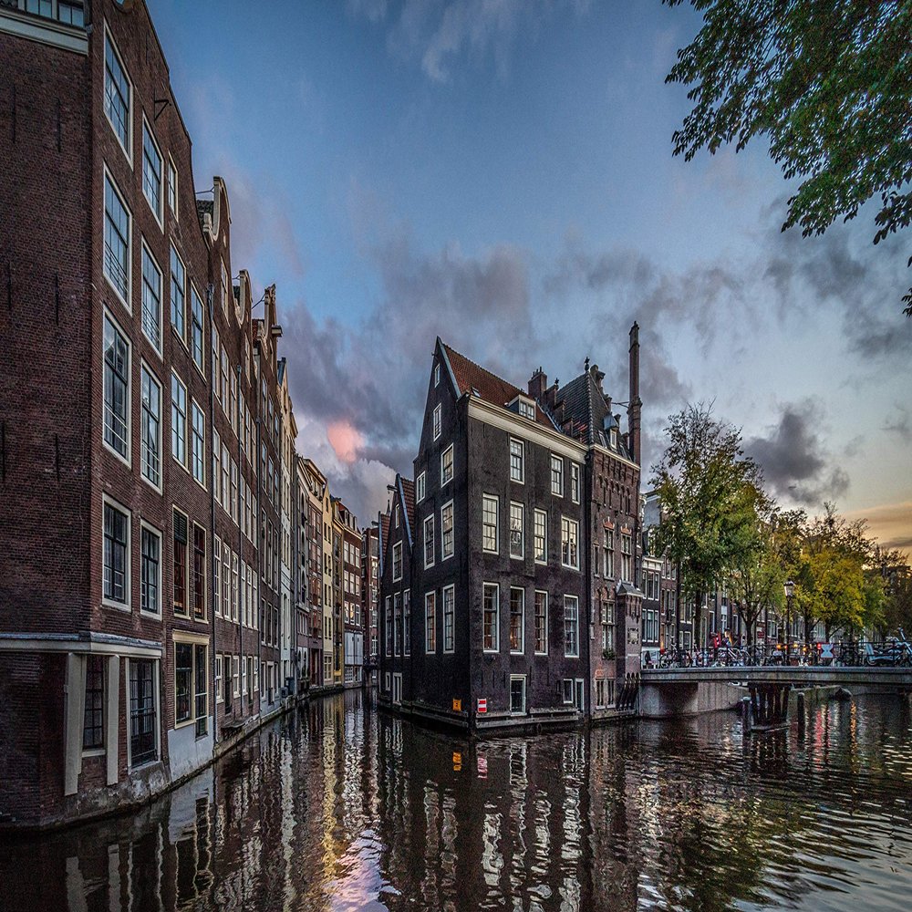 Iconic Arts Laminated 24x36 Poster: Amsterdam Bridge Building and Canal Netherlands 4k hd Travel HD