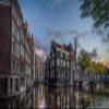 Iconic Arts Laminated 24x36 Poster: Amsterdam Bridge Building and Canal Netherlands 4k hd Travel HD view 1