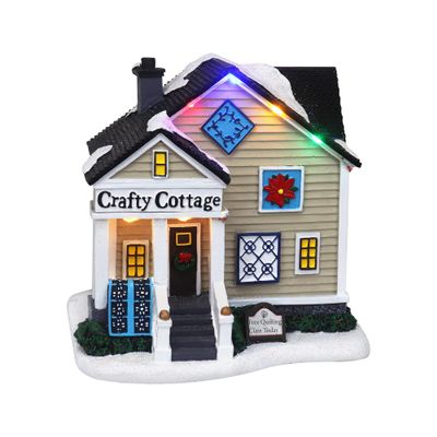Christmas Village Crafty Cottage - Lighted Musical Snow Village Collectible Building - Perfect Addition to Your Christmas Indoor Decorations & Holiday Displays - A Thoughtful Gift to your Loved Ones