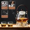 40oz Glass Teapot with Anti-Drip Spout, Peach Wood Handle and Lid, Heat-Resistant Borosilicate Glass, Dual Infusers for Steaming and Boiling view 2