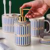 JruF Bathroom Accessories Set, 6 Piece Ceramic Bath Accessory Completes with Soap Dispenser, Toothbrush Holder, Tumbler, Soap Dish, Tray Great for Modern Bath Sink Tub Decor (Blue Gold Stripes) view 3