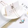 TIANZXS Stainless Steel Cremation urn Necklace Light Blue Birthstone Memorial Ashes Holder Keepsake Heart urn Locket Angel Wings Ashes Rose Gold view 2