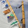 WA, Boat sail and flags at Bainbridge Island by Don Paulson - view 1