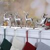 Deer Christmas Stocking Holders for Mantle Set of 4Reindeer and Sleigh Christmas Stocking Holders for Fireplace,Xmas Mantel Hooks Stocking Hanger for Mantle Christmas Hanging Grip Stockings Clip view 1
