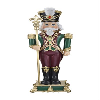 Haute Decor 35 inch Tall Solid Resin Decorative Holiday Nutcracker with Fleur de Lis