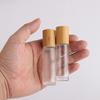 18 pcs Empty Bamboo 10ml Glass Frosted Roller Bottles for Essential Oil, 0.33OZ Essential Oil Roller Bottles with bamboo lid and with Stainless Steel Roller Ball view 3