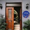 ArogGeld Welcome to Our Home Circle Wood Sign Blue Floral Christmas Wreath Wooden Sign Christmas Wood Hanging Sign Wall Art Home Decoration for Front Door Garden Porch Bedroom view 3