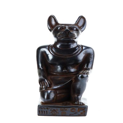 Ancient Egyptian statue of goddess Bastet cat seated black solid stone made in Egypt. her late form a cat-headed woman, rather than a lioness Bastet was goddess of protection,cats, fertility