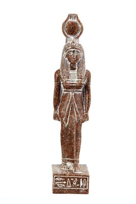 Ancient Egyptian statue of goddess Isis heavy granite stone made in Egypt. Great mother Isis, the goddess of healing and magic her name mean Queen of the Throne.