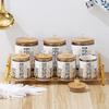 8 Piece Ceramic Canister Jar Set with a Stand and Air tight Bamboo Lids with KNOB. (White W/ Gold Black Pattern), White,Gold view 2