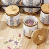 8 Piece Ceramic Canister Jar Set with a Stand and Air tight Bamboo Lids with KNOB. (White W/ Gold Black Pattern), White,Gold view 4