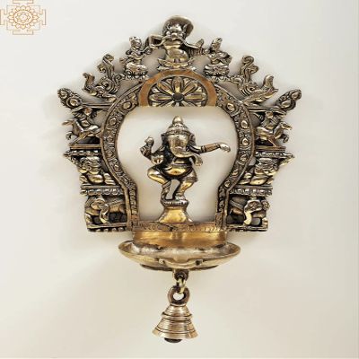 Exotic India 12" Brass Dancing Ganesha Frame Diya with Bell | Handmade - Brass