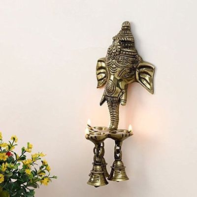 ARTVARKO Brass Ganesh Ganesha Wall Hanging Idol Oil Lamp Three Diyas and Bells Puja Gifting Entrance Home Decor Idol 9.5 Inch.