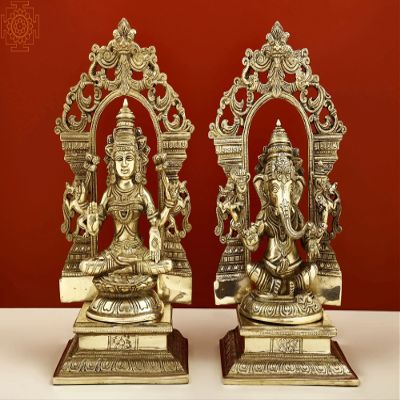 Exotic India 12" Brass Lord Ganesha and Goddess Lakshmi with Kirtimukha Prabhavali - Brass