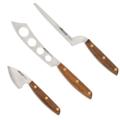 Arcos Cheese Knife set 3 pieces. Nitrum Stainless Steel. Very useful set for irregular pieces of hard cheeses, soft cheeses and creamy cheeses. Handle 100% Ovengkol wood Series Nordika. Color Brown.